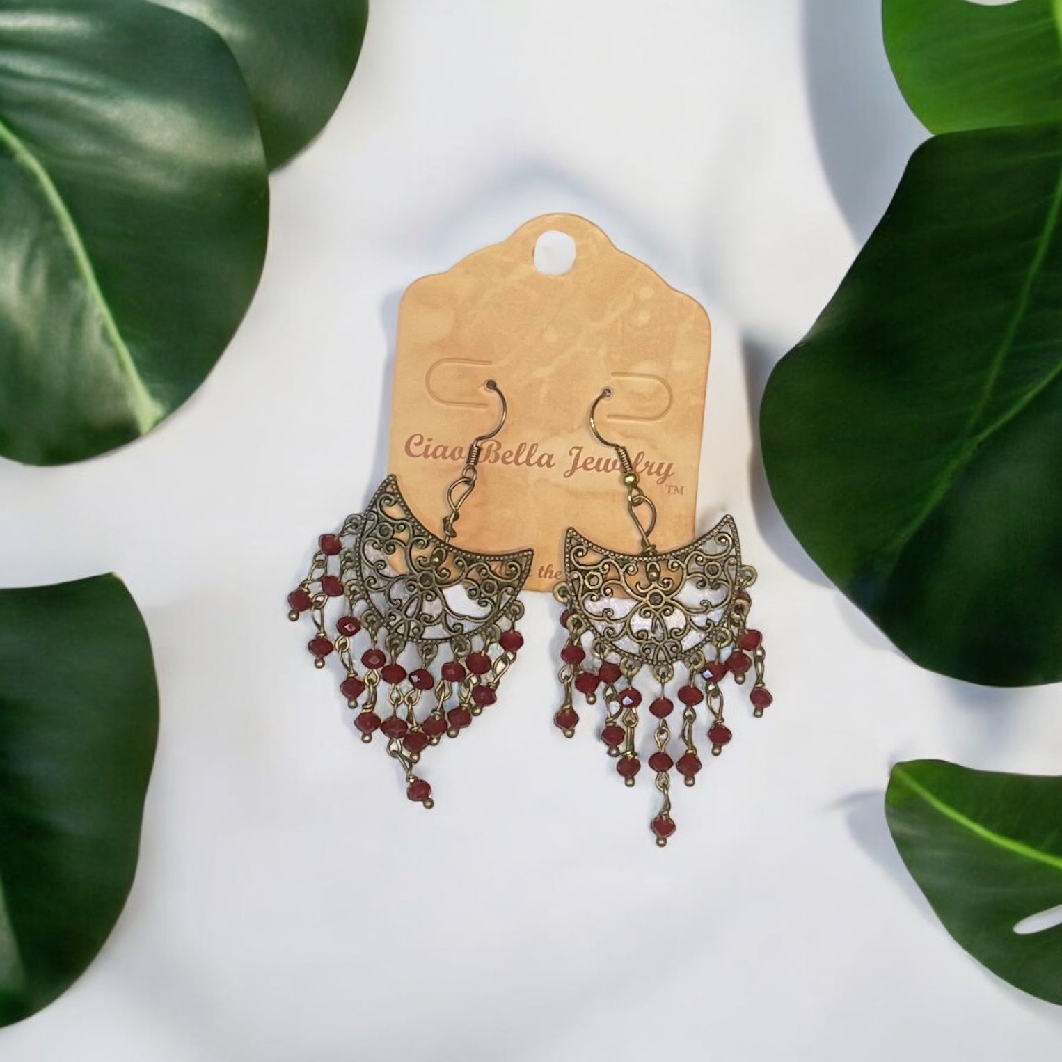Luxurious Copper Filigree Chandelier Earrings with Dark Red Crystals
