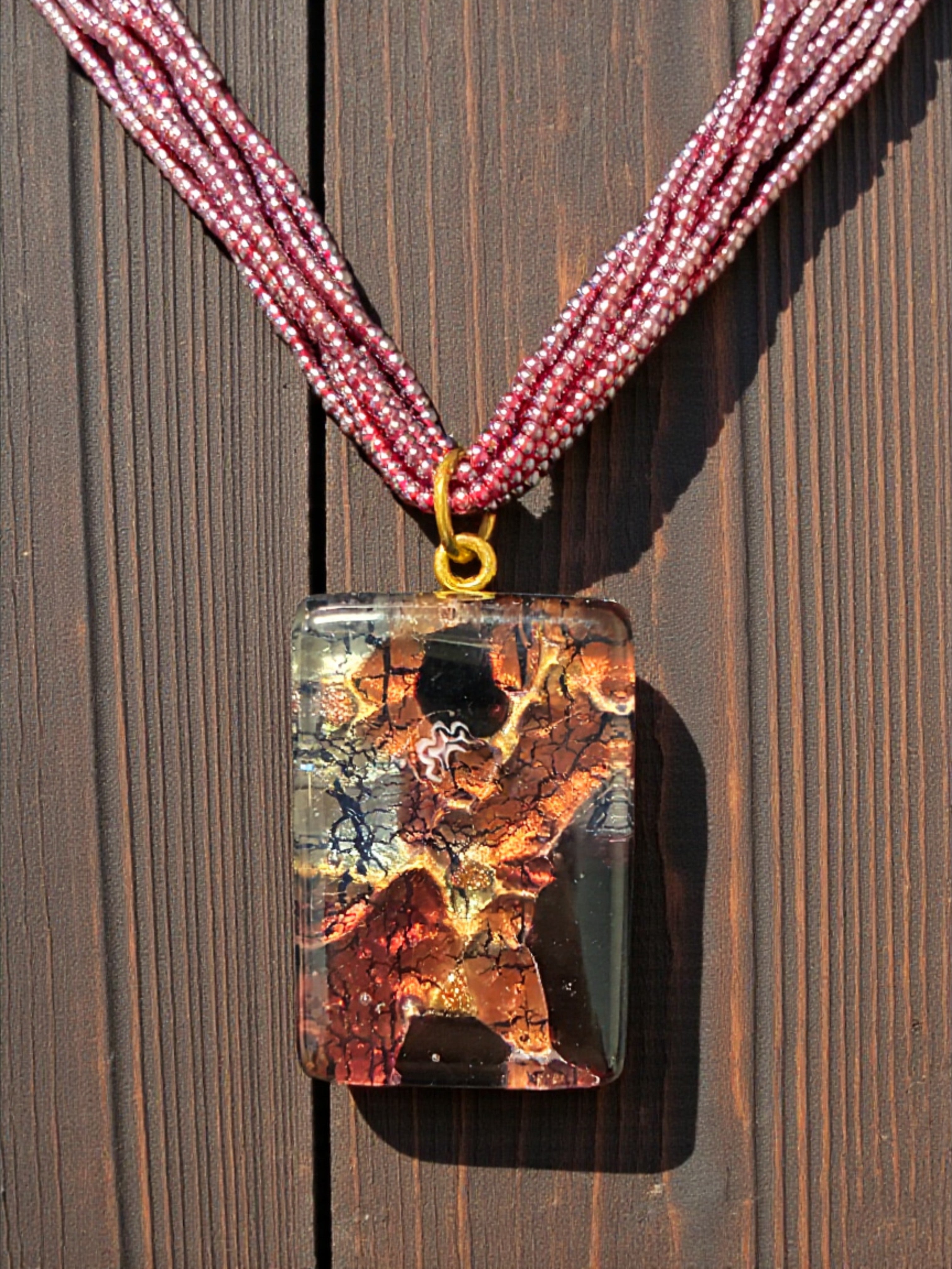 Elegant Amber and Black Murano Glass Rectangle Pendant with Pink Multi-Strand Beads