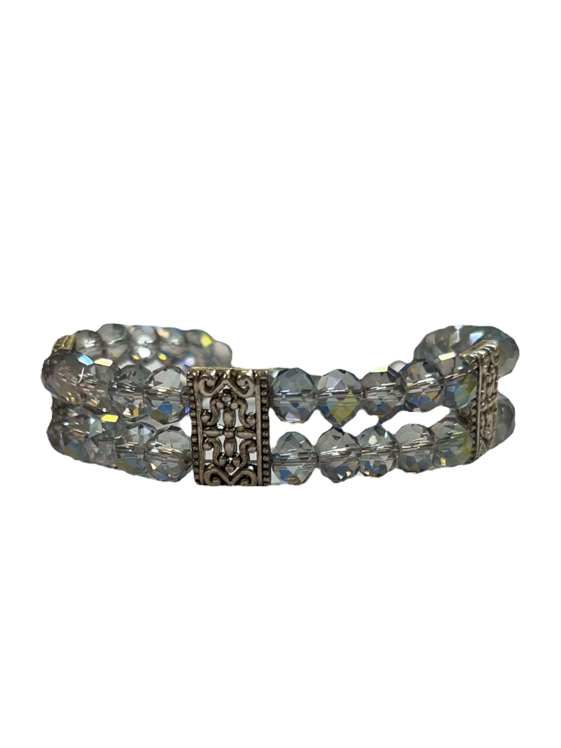 A double-strand clear crystal bracelet with a toggle clasp, closed with two possible circles for adjusting sizes.