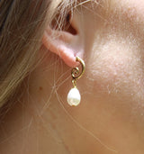 Golden Elegance: Swirling Drop Earrings with Delicate Pearl