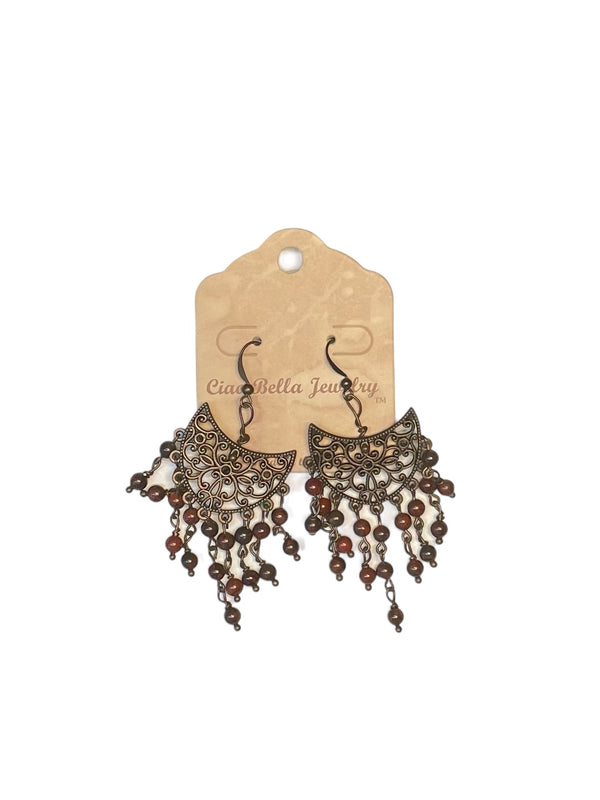 Luxurious Copper Filigree Chandelier Earrings with Dark Red Crystals