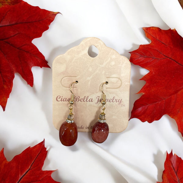 Mesmerizing Deep Red Agate Oval Dangle Earrings: Gold & Crystals