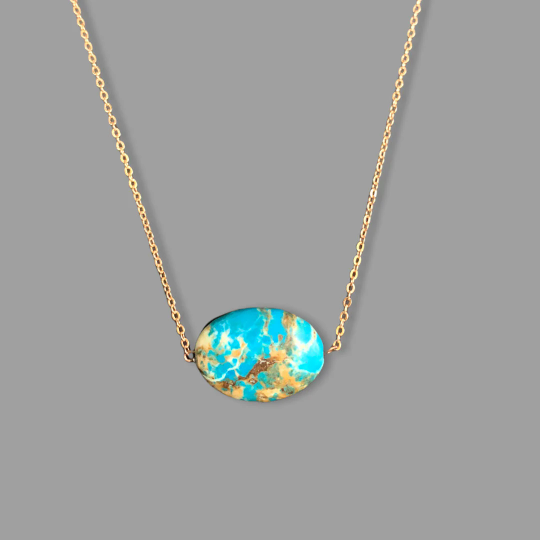 Turquoise pendant on gold chain
